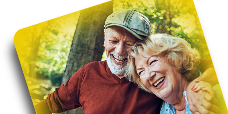 Photo of man and woman laughing with a buccal film background